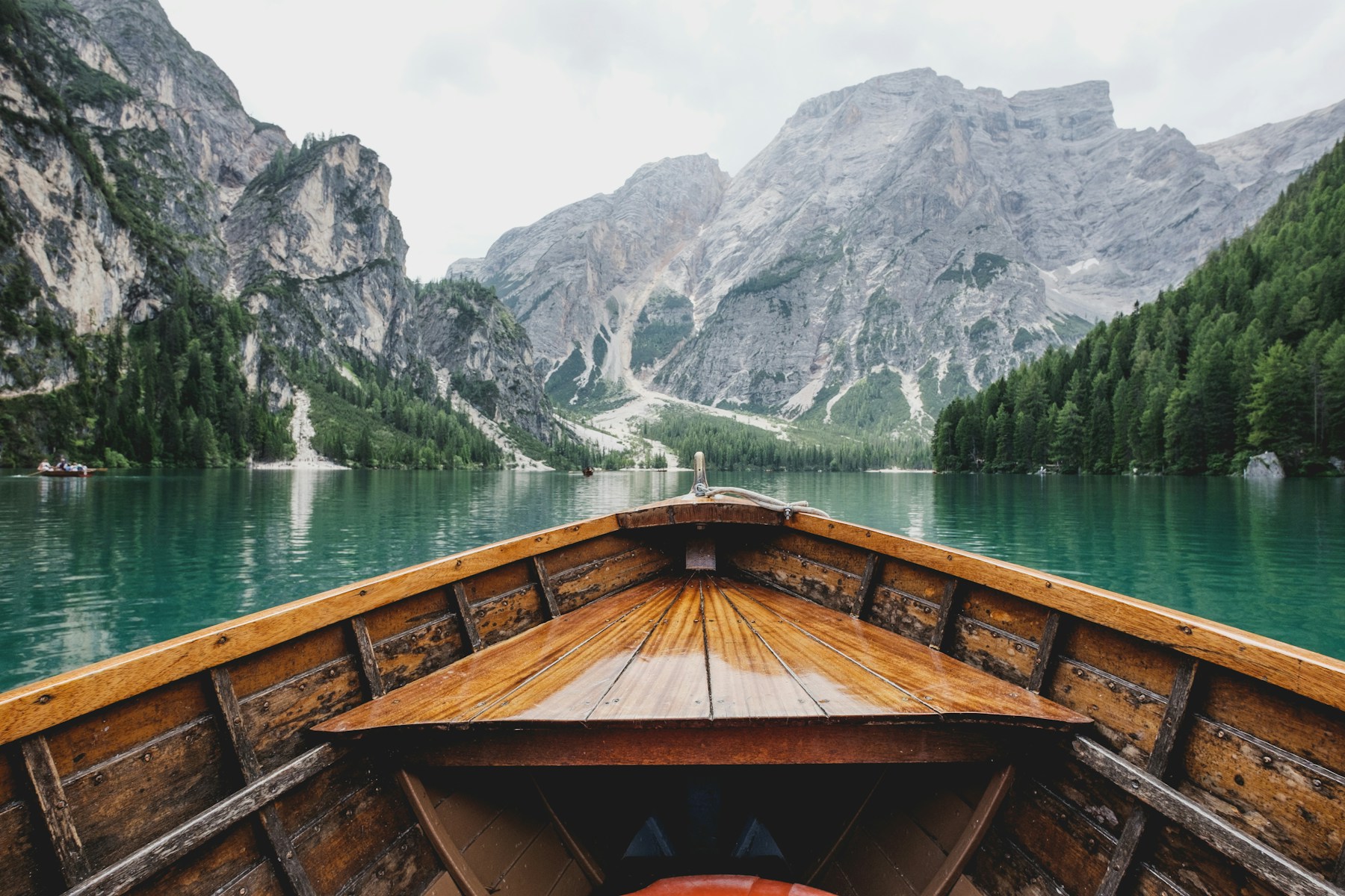 Wooden boat on a mountain lake in the European Alps